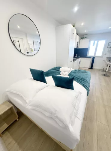 loc smart appart hotel argenteuil peace and love vue ensemble chambre cuisine 02